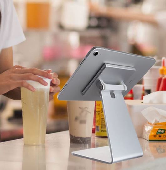 Tablet holder in use at a shop counter